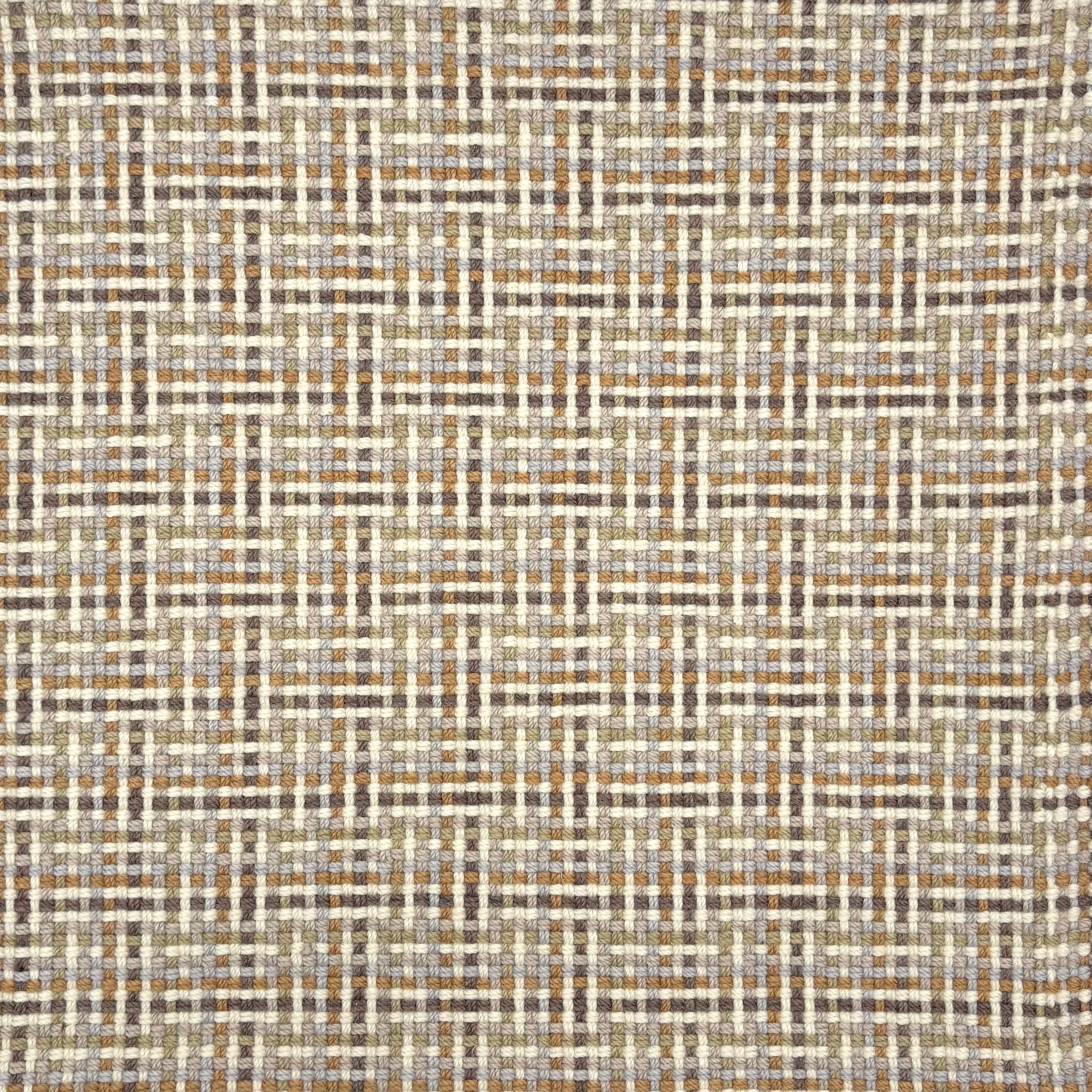 Flatwoven rug in a dense basketweave pattern in cream, tan, brown, sage and slate grey. 