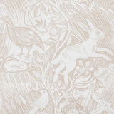 Detail of wallpaper in a playful rabbit and bird print in tan on a white field.