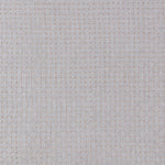 Embroidered fabric with a basketweave design in cream on a beige field. 
