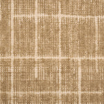 Textured carpet with a checkered pattern in tan and beige tones.