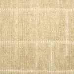 Textured carpet with a checkered pattern in beige tones.