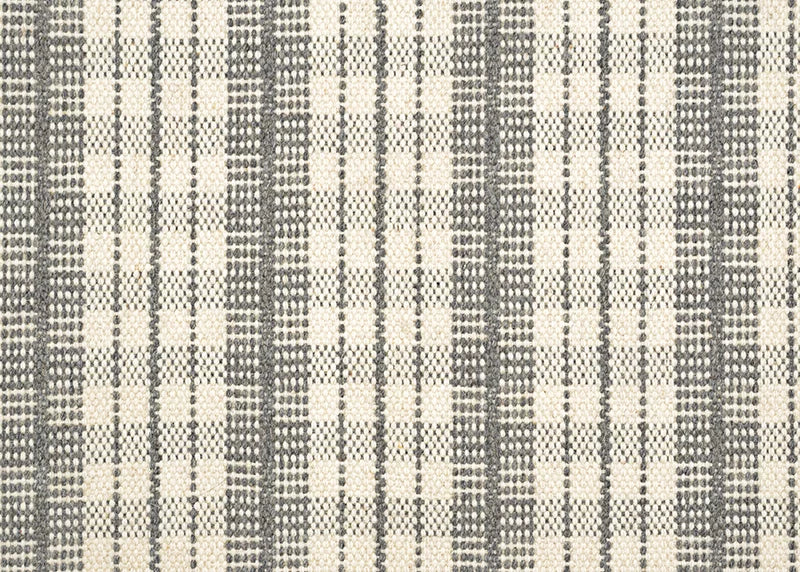 Broadloom carpet in a mixed width stripe design in ivory on a grey field. 