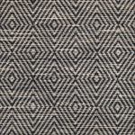 Broadloom sample in a dimensional diamond pattern in charcoal grey and ivory.