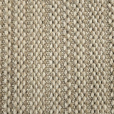 Broadloom carpet in a textured stripe in warm tan. 
