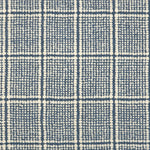 Broadloom carpet with windowpane check in cream and blue.