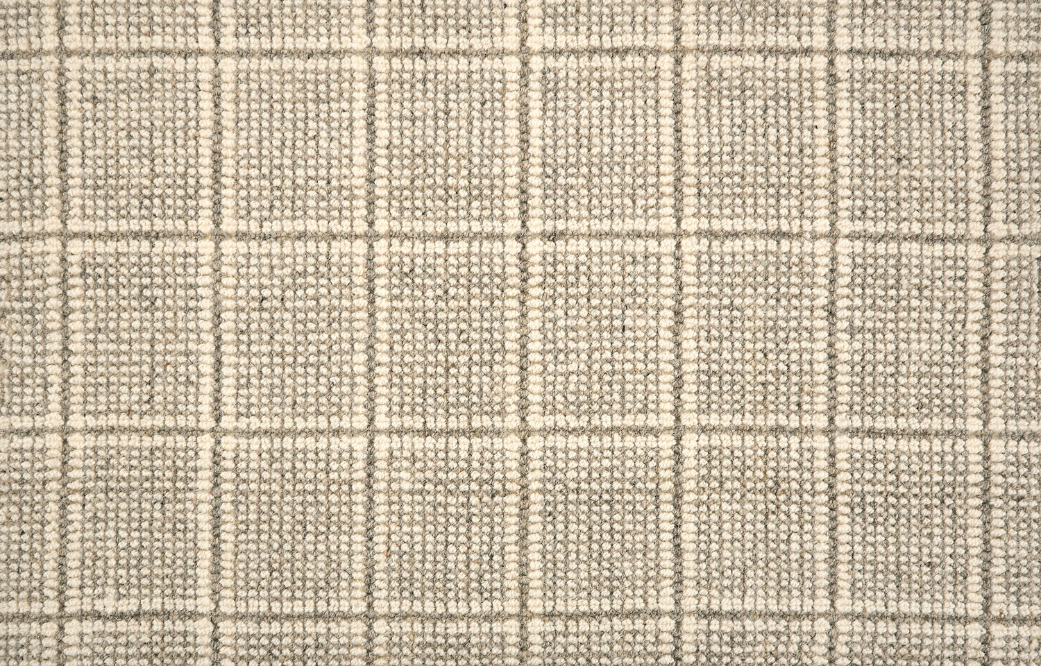 Broadloom carpet with windowpane check in cream and taupe.