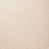 Detail of wallpaper in a honeycomb grid print in pastel pink on a cream field.