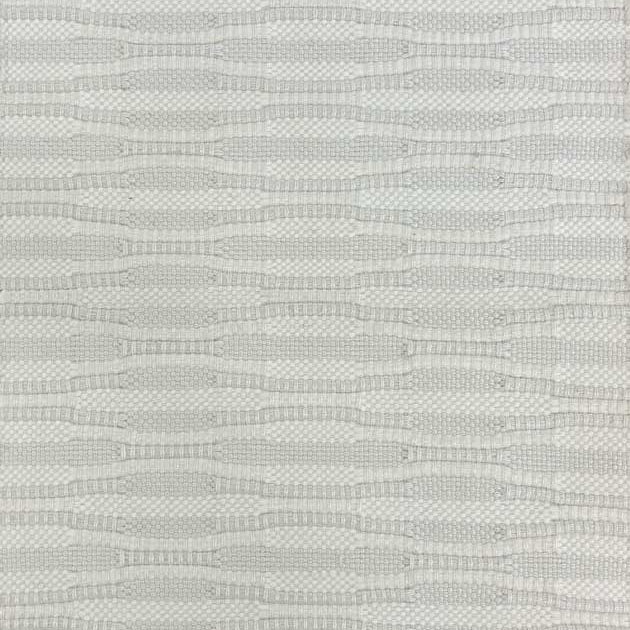 Broadloom carpet in a flatwoven wavy stripe in cream on a cream field. 