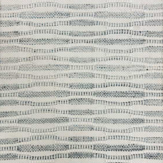 Broadloom carpet in a flatwoven wavy stripe in grey on a cream field. 