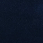 Detail of velvet fabric yardage in indigo.