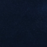 Detail of velvet fabric yardage in indigo.