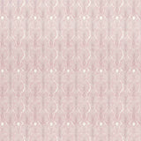 Detail of wallpaper in an art deco damask print in pink on a white field.