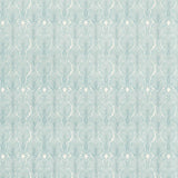 Detail of wallpaper in an art deco damask print in blue on a white field.