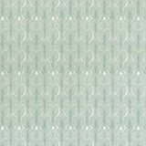 Detail of wallpaper in an art deco damask print in turquoise on a white field.