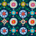 Detail of wallpaper in a playful floral pattern in a rainbow of colors on a navy field.