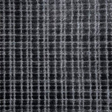 Broadloom carpet in a textural grid in charcoal grey. 