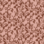 Floral patterned wallpaper in pink and brown. 