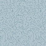 Detail of wallpaper in a minimalist floral print in navy on a blue field.