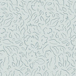 Detail of wallpaper in a minimalist floral print in navy on a turquoise field.
