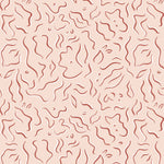 Detail of wallpaper in a painterly floral print in rust and white on a light pink field.
