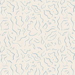 Detail of wallpaper in a painterly floral print in blue and white on a tan field.