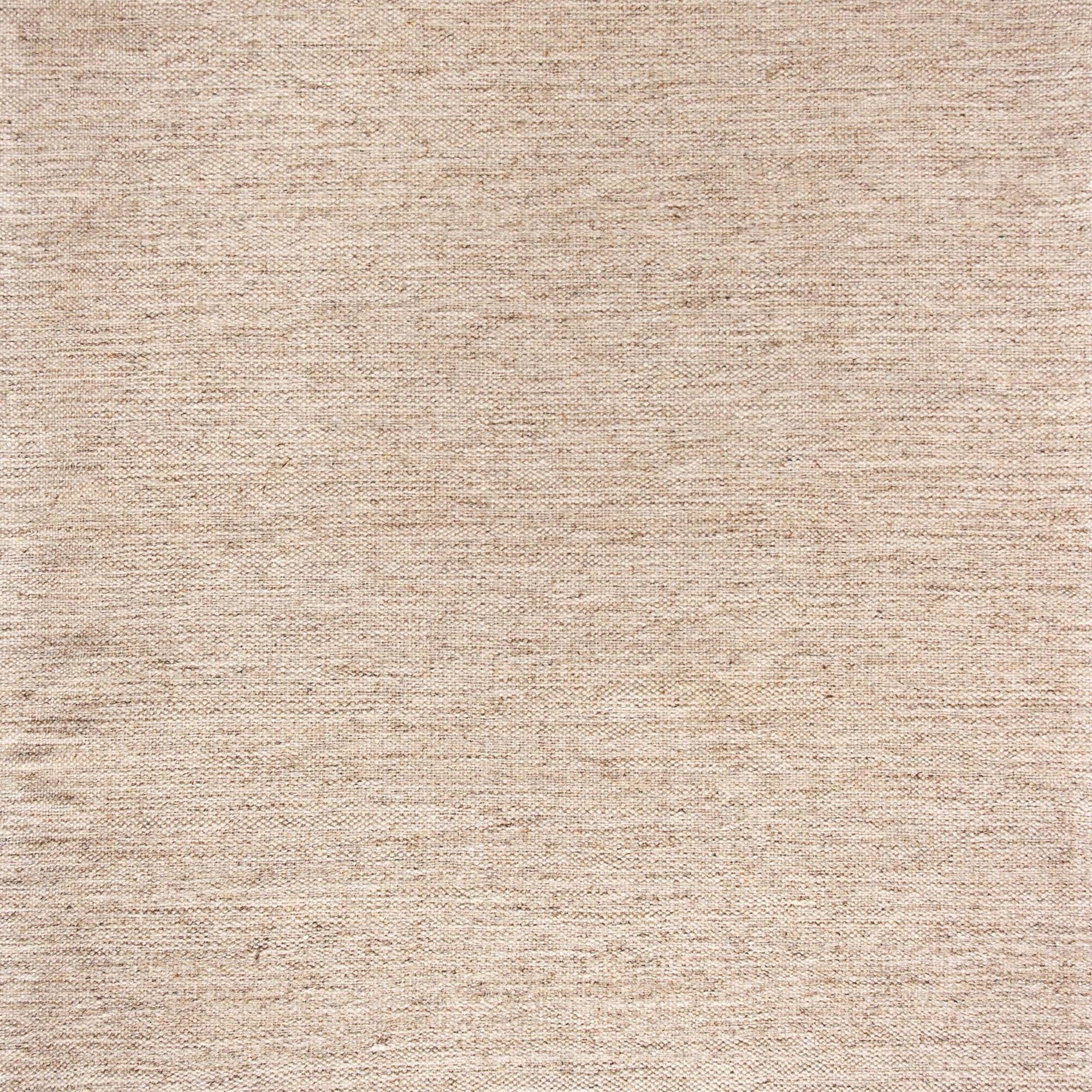 Broadloom carpet in a subtle textural solid in warm birch beige.