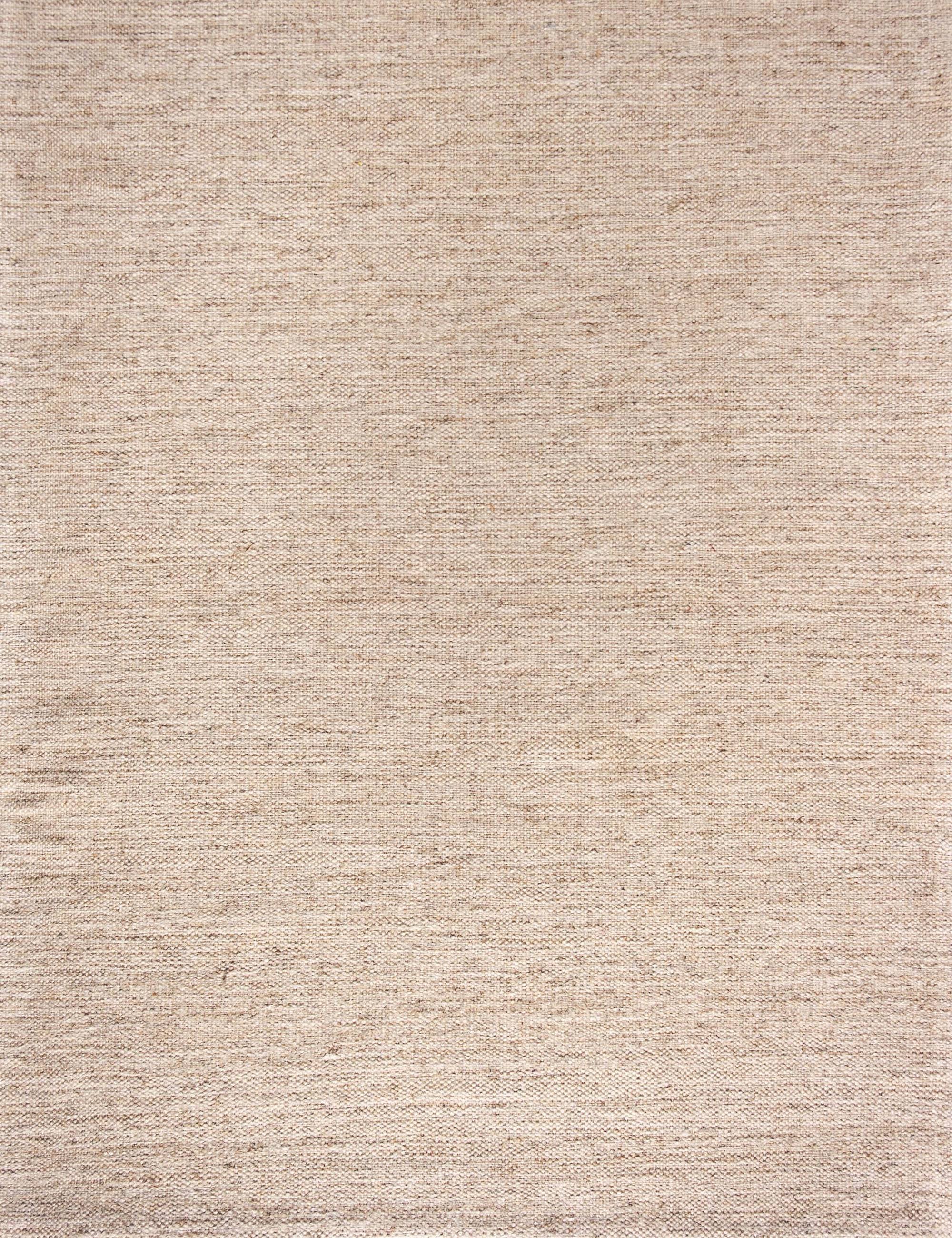 Broadloom carpet in a subtle textural solid in warm birch beige.
