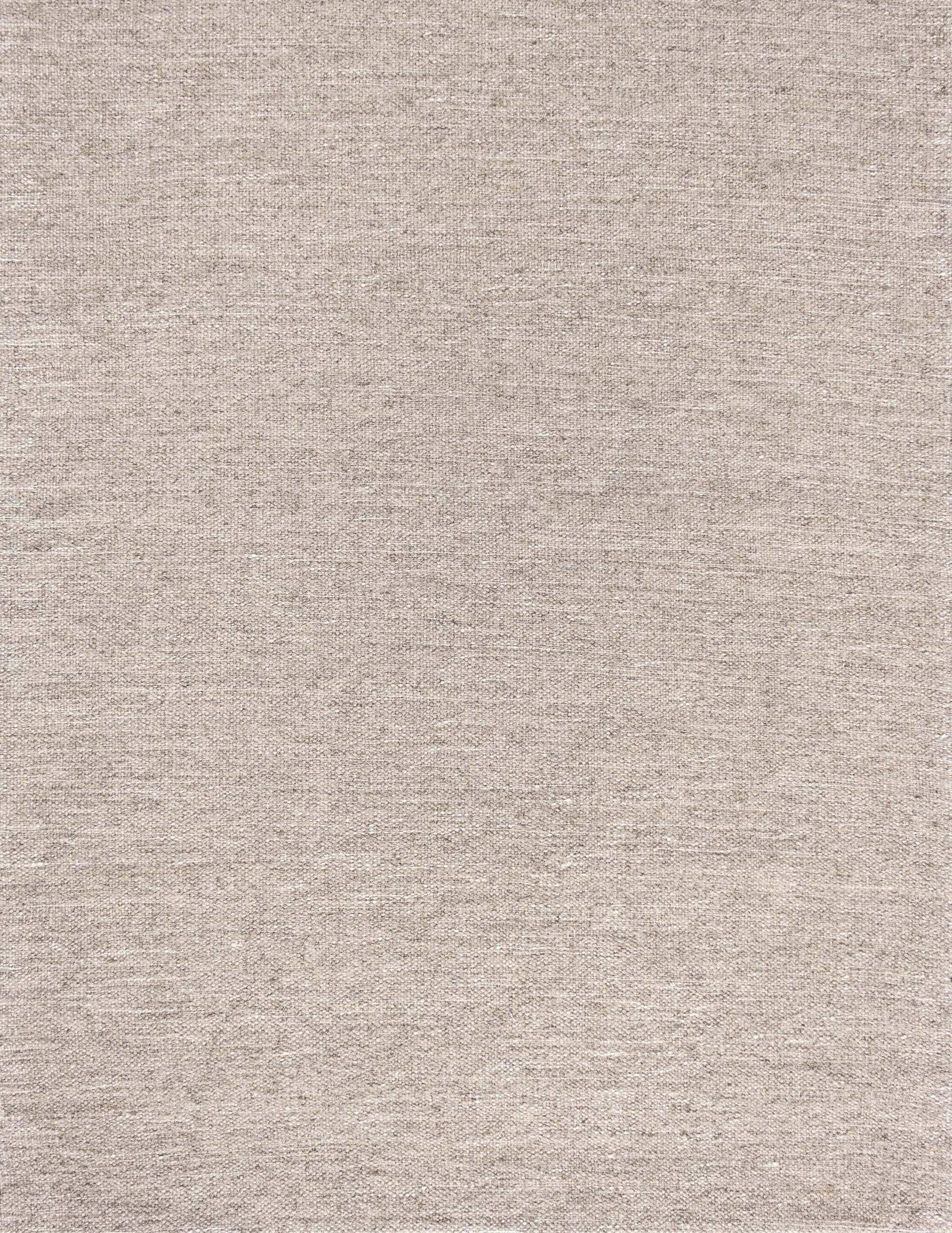 Broadloom carpet in a subtle textural solid in grey canvas.