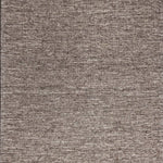 Broadloom carpet in a subtle textural solid in heather natural grey.