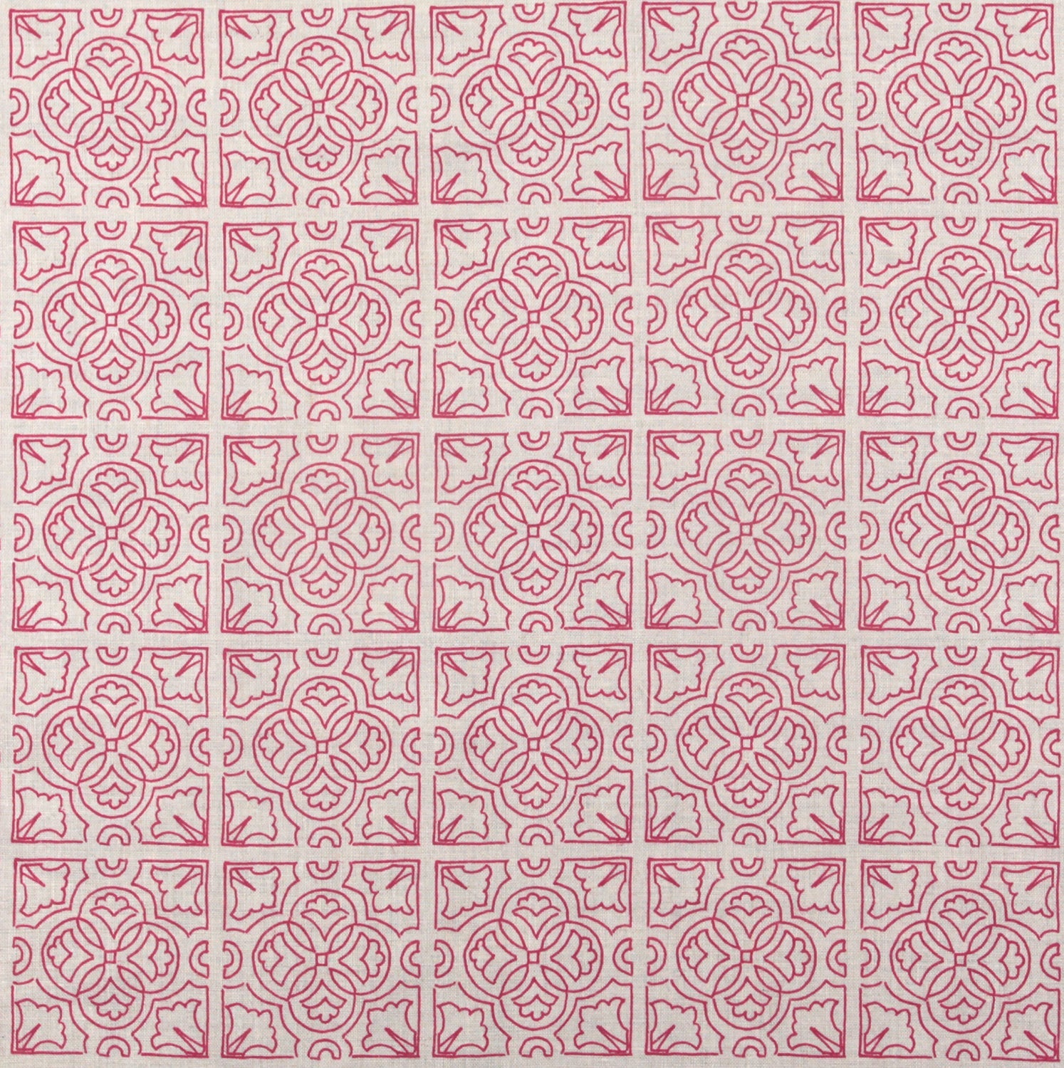 Detail of fabric in a damask lattice print in magenta on a cream field.