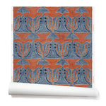 Wallpaper roll with a stamped painted floral motif in red and cobalt on a medium blue background