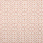 Broadloom carpet in a dense circle lattice with small floral accents in light pink a cream field.