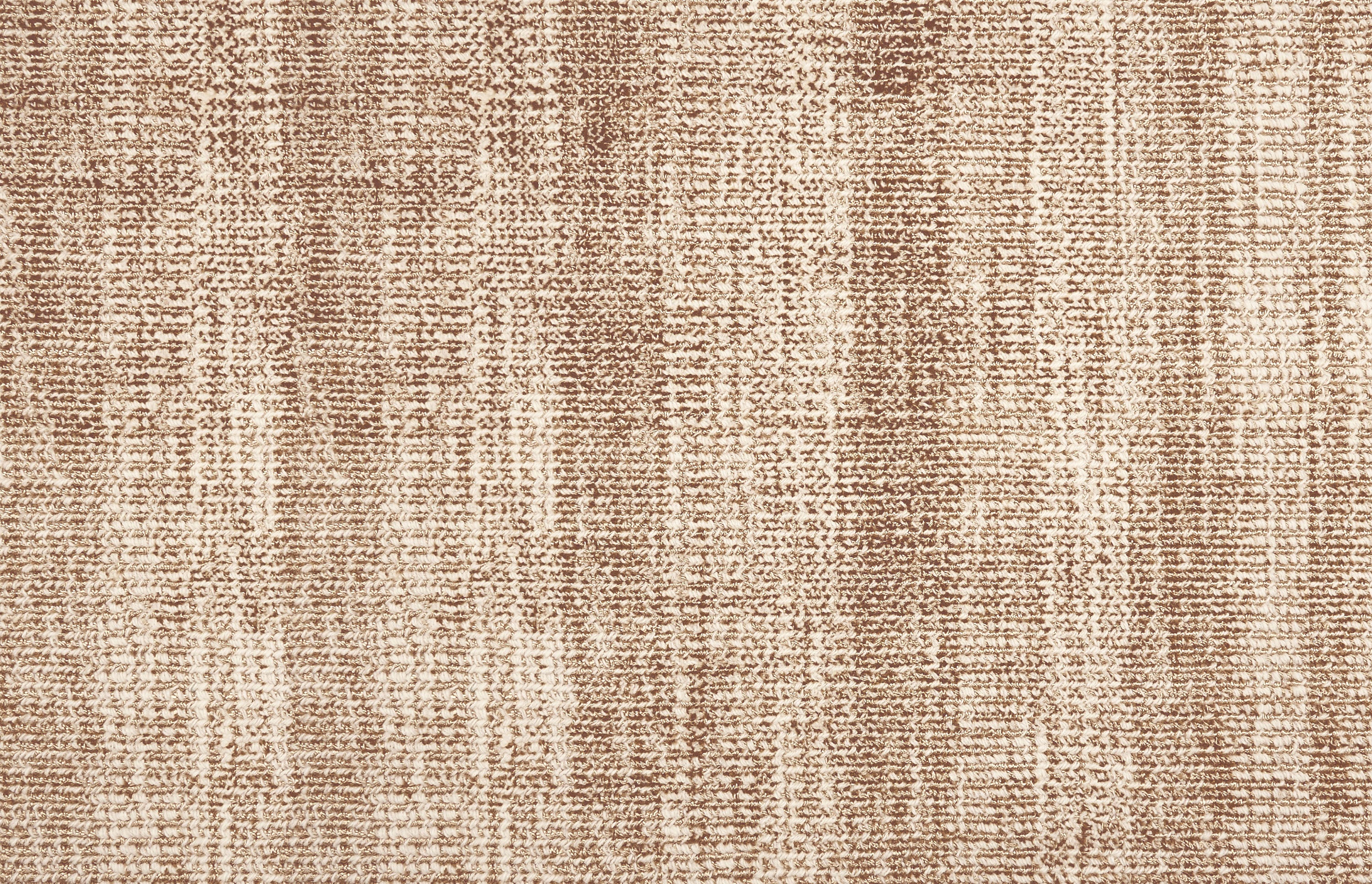 Broadloom carpet with textural weave in cream and brown.