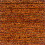 Woven rug swatch in natural fibers in an orange and dark brown stripe pattern