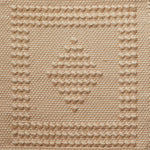 Flatwoven rug with a raised border and diamond design in tan and cream.