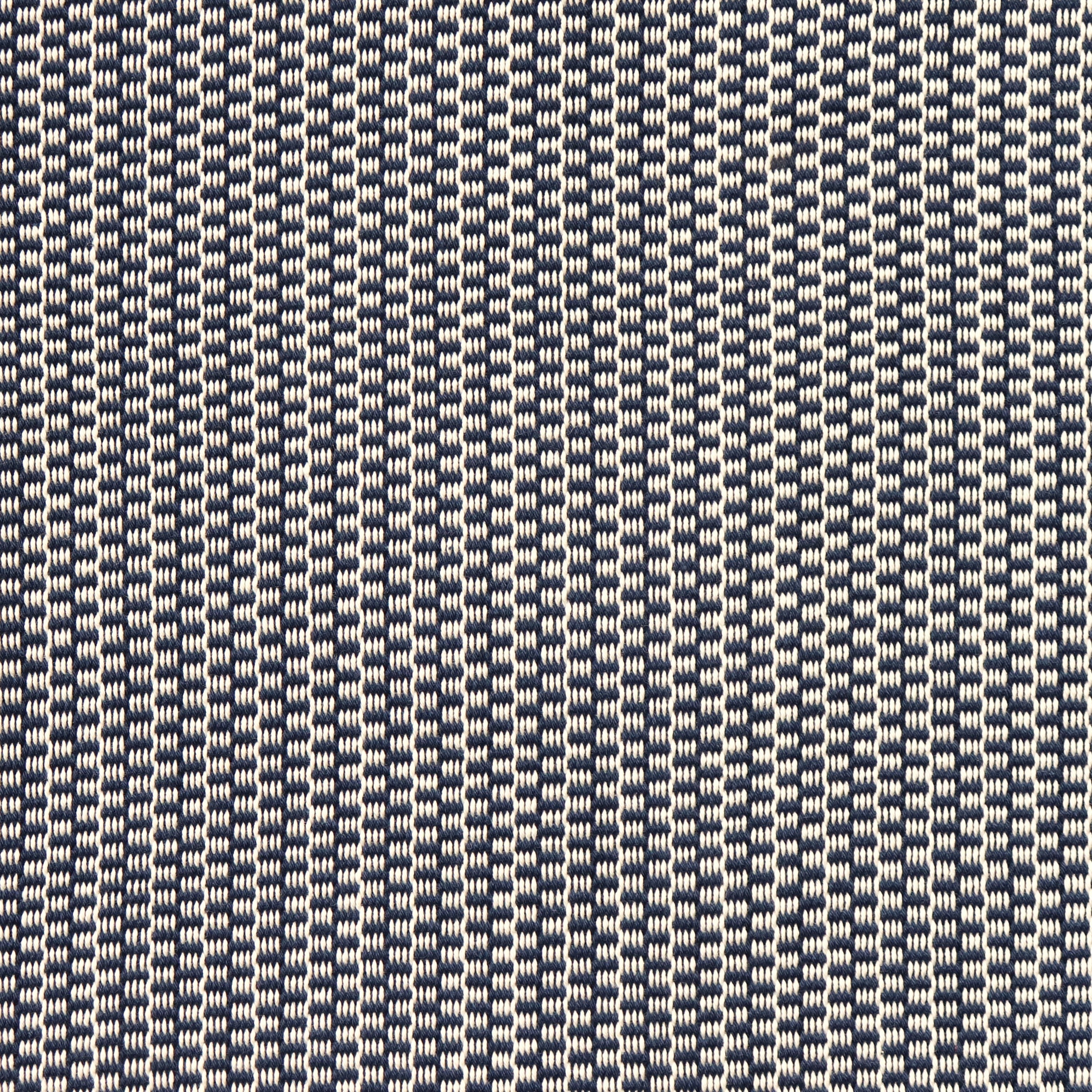 Detail of a hand-woven cotton striped fabric in navy blue and white.