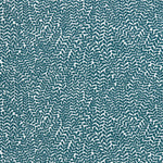 Detail of fabric in a scrolling stem and leaf print in turquoise on a white field.