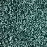 Detail of wallpaper in a scrolling stem and leaf print in dark green on a light blue field.
