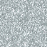 Detail of fabric in a scrolling stem and leaf print in blue-gray on a white field.