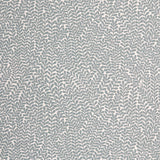 Detail of wallpaper in a scrolling stem and leaf print in blue-gray on a white field.