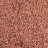 Detail of wallpaper in a scrolling stem and leaf print in coral on a maroon field.