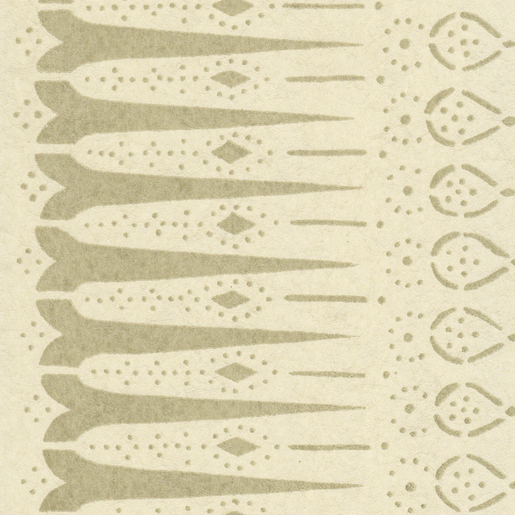 Detail of wallpaper in a bordered teardrop print in tan on a cream field.
