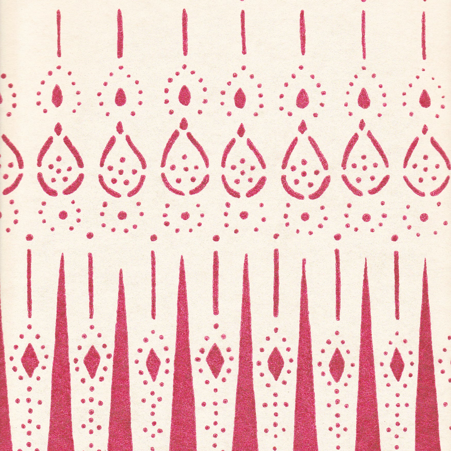 Detail of wallpaper in a bordered teardrop print in dark pink on a cream field.