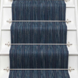 Striped flatweave runner in blue on white staircase