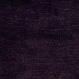 Handknotted rug in pashmina and silk in solid cut pile in dark purple.