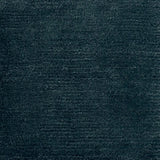 Handknotted rug in wool and merino in solid cut pile in dark teal blue.