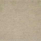 Handknotted rug in wool and merino in solid cut pile in warm beige. 