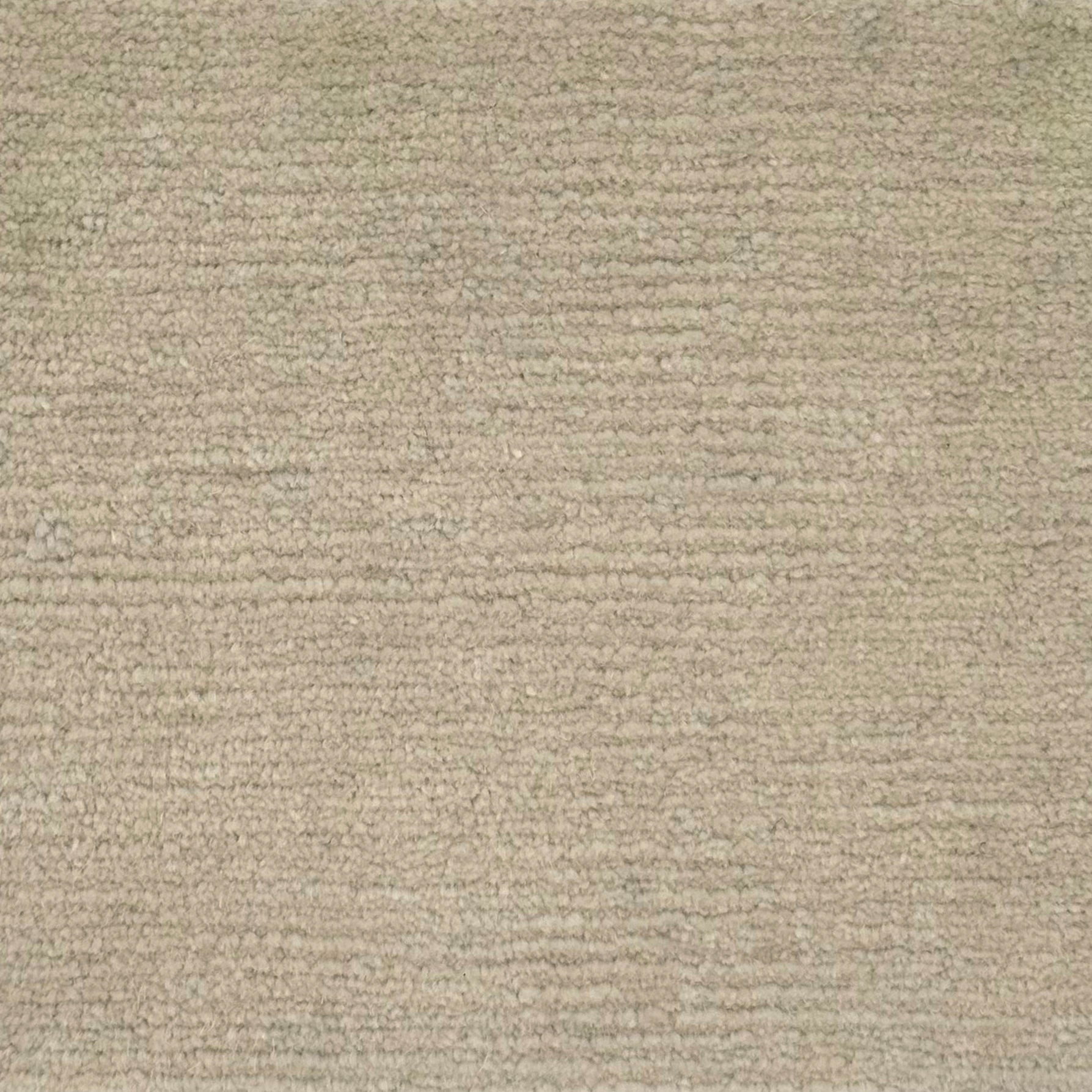 Handknotted rug in wool and merino in solid cut pile in warm beige. 