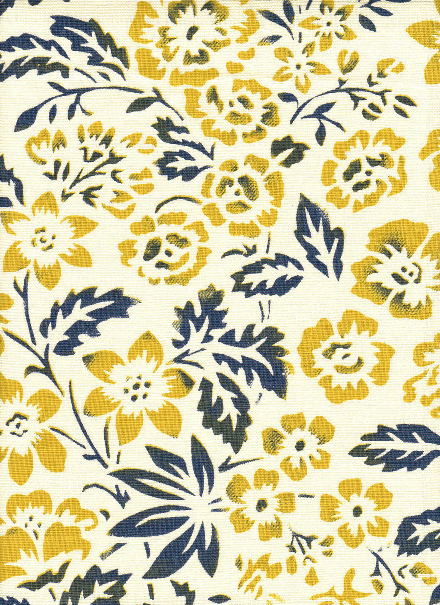 Detail of fabric in a floral print in mottled navy and yellow on a cream field.