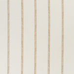 printed linen fabric in a minimal geometric linear pattern in gold on a cream field.